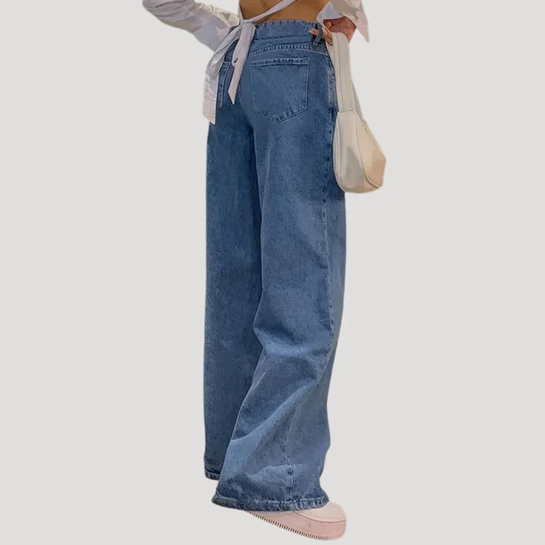 Dam lågmidjade blå vida denimjeans med breda ben och lös passform - Bild 4
