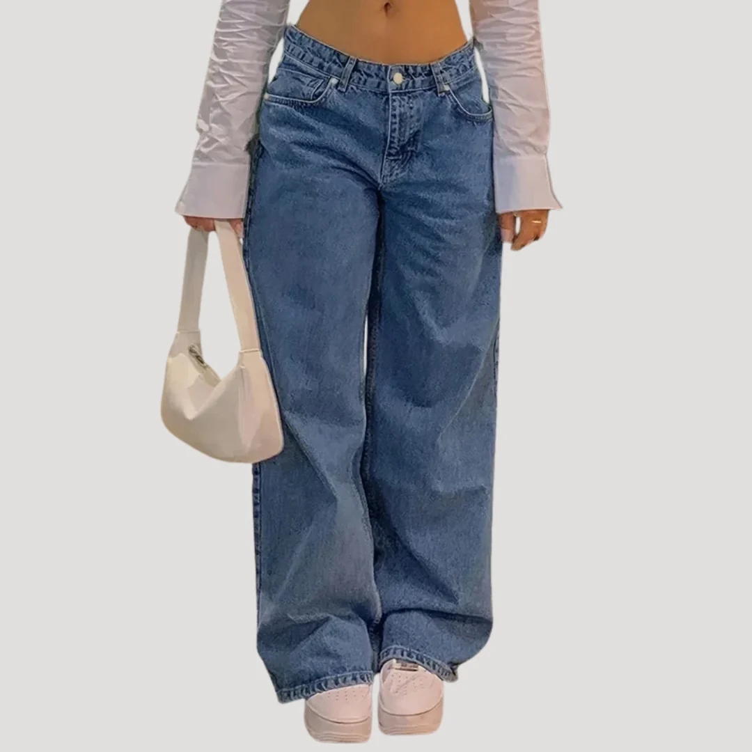 Dam lågmidjade blå vida denimjeans med breda ben och lös passform