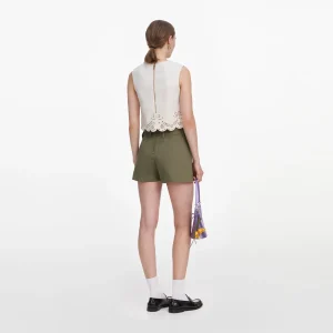 Crème broderie denimtopp