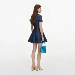 Sträckt stjärnstickad jeansminidress